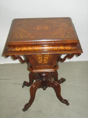 Appraisal: A VICTORIAN ROSEWOOD AND MARQUETRY SEWING TABLE of oblong form