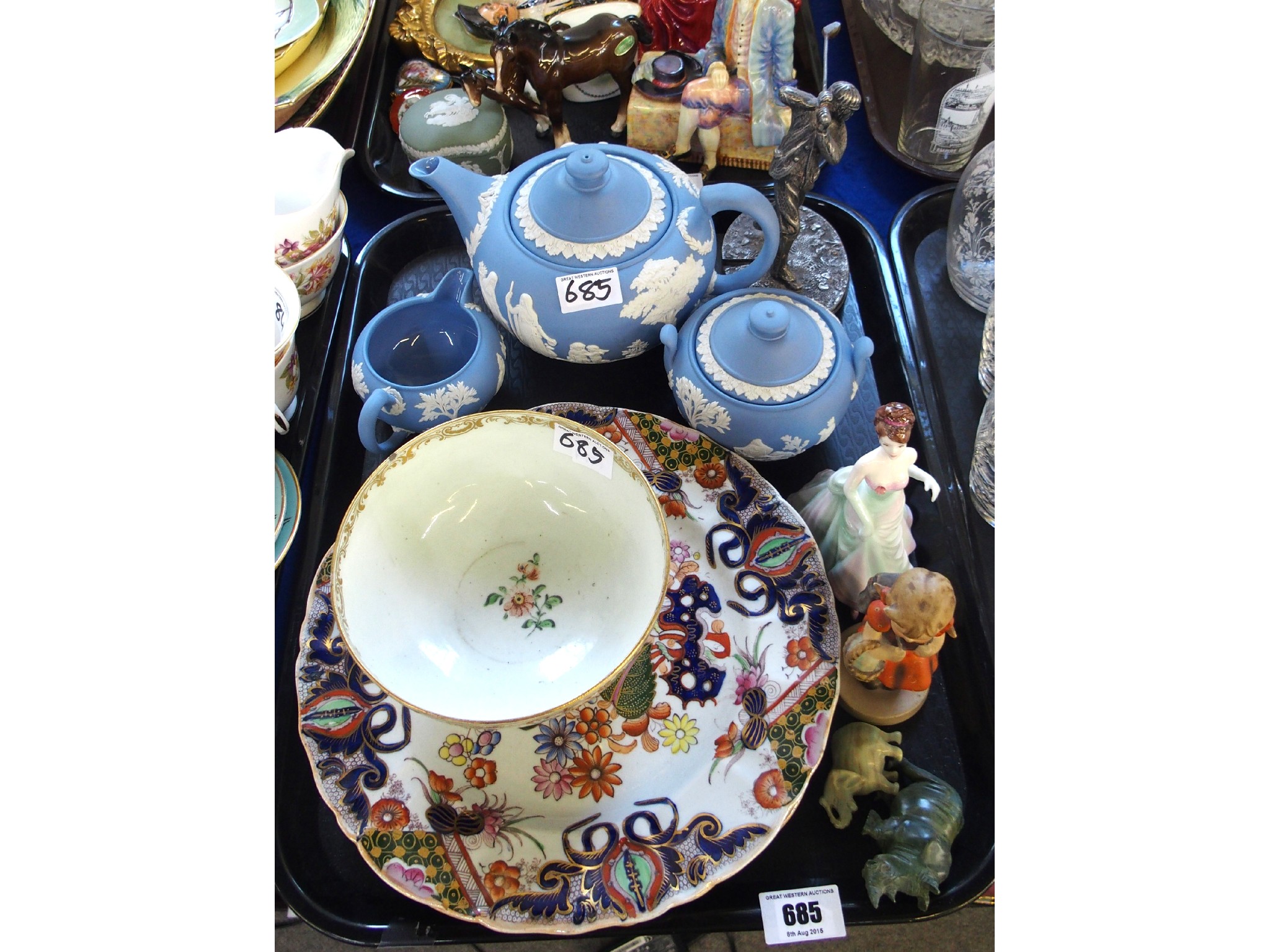 Appraisal: Tray comprising a Hummel figure three-piece Jasperware tea set Coalport