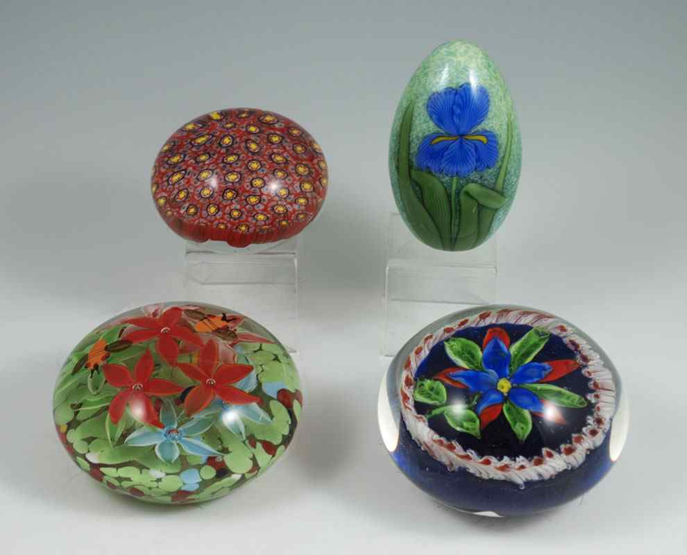 Appraisal: ART GLASS PAPERWEIGHTS To include Orient Flume egg shaped paperweight