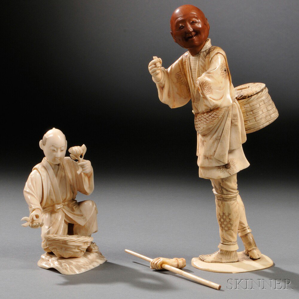 Appraisal: Two Ivory Figures Japan th th century a fisherman carrying