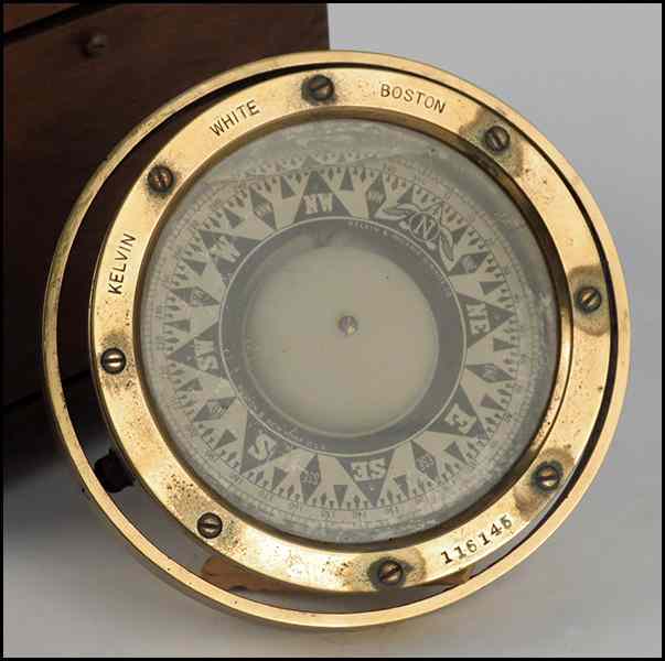 Appraisal: BRASS NAUTICAL COMPASS Mounted in a wood box Kelvin and