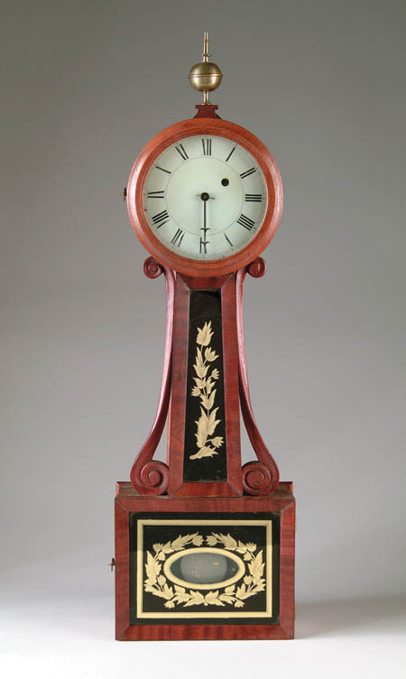 Appraisal: MAHOGANY BANJO CLOCK The mahogany case has a gilt and