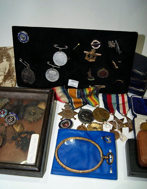 Appraisal: A SUITE OF THREE WW MEDALS including a War Medal