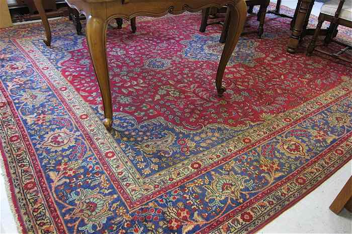 Appraisal: SEMI-ANTIQUE PERSIAN CARPET floral and central floral medallion type with