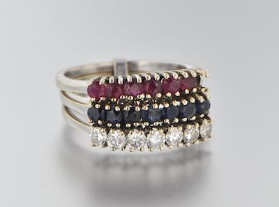 Appraisal: A Set of Three Ring with Diamonds Rubies and Sapphires