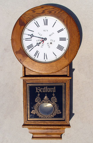 Appraisal: BEDFORD OAK REGULATOR WALL CLOCK Metal face with additional day