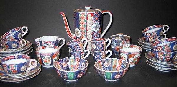 Appraisal: An assembled partial Imari style porcelain coffee set Including one