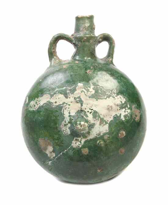 Appraisal: A Middle Eastern Green Glaze Pottery Flask of circular form