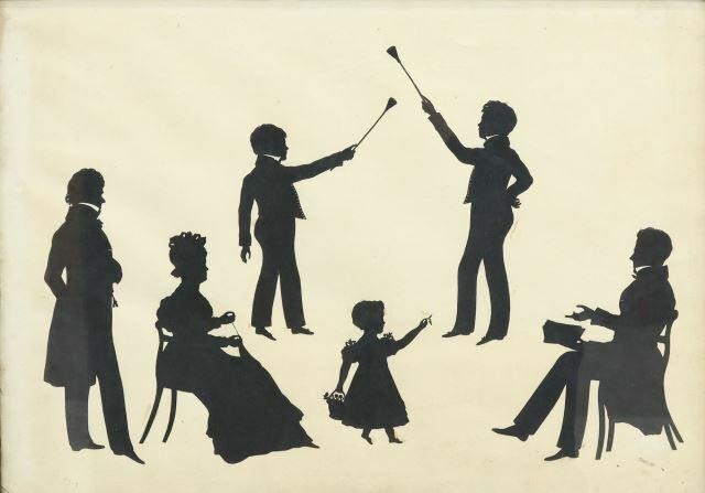 Appraisal: Framed cutout portrait silhouettes of a family including seated woman