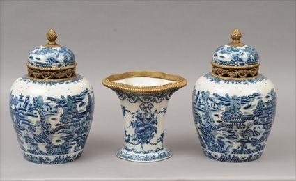 Appraisal: Pair of Chinese-Style Brass-Mounted Blue and White Ceramic Ginger Jars