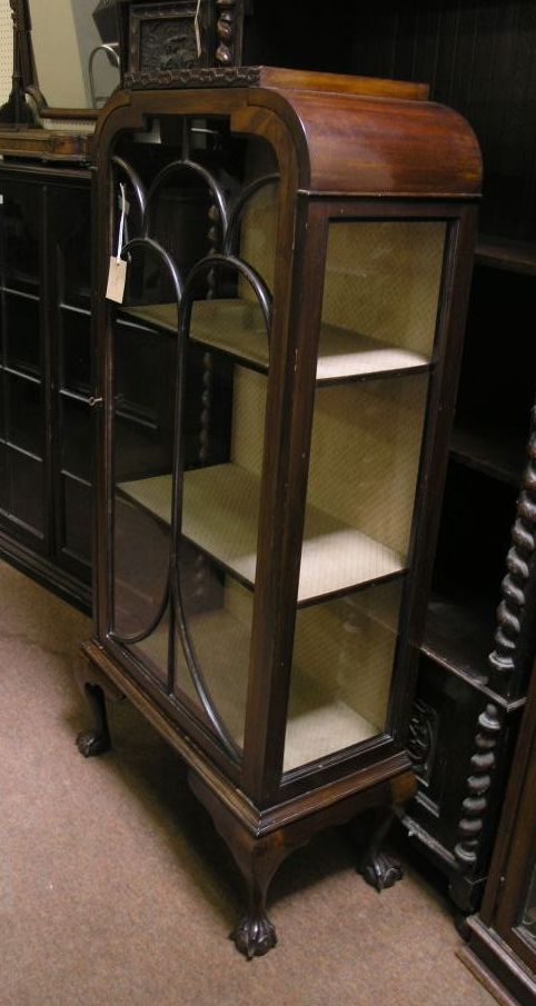 Appraisal: An early th century mahogany display cabinet lined interior with