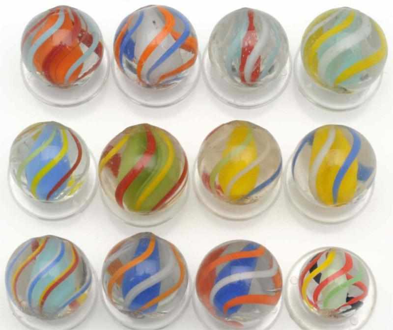 Appraisal: Lot of English Style Solid Core Swirl Marbles Includes one