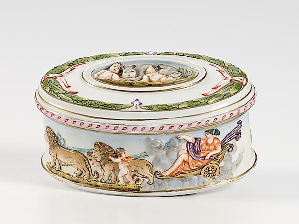 Appraisal: CAPO-DI-MONTE-STYLE DRESSER BOX th century oval lidded form with low-relief