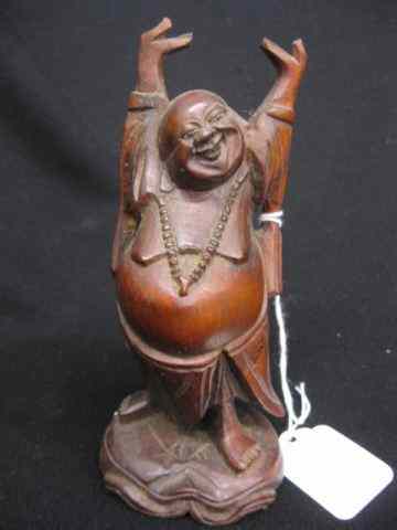 Appraisal: Chinese Carved Wood Figure of a Buddha hands raised over