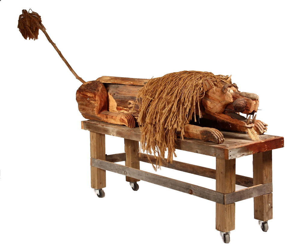 Appraisal: FOLK ART LION SCULPTURE - Figure of a Reclining Lion