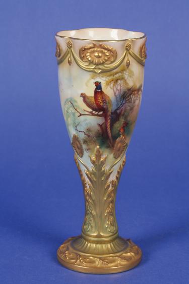 Appraisal: A ROYAL WORCESTER TRUMPET SHAPED VASE decorated with a peacock