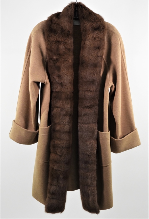 Appraisal: STIZZOLI FUR TRIMMED KNIT JACKET Tan knit jacket with brown