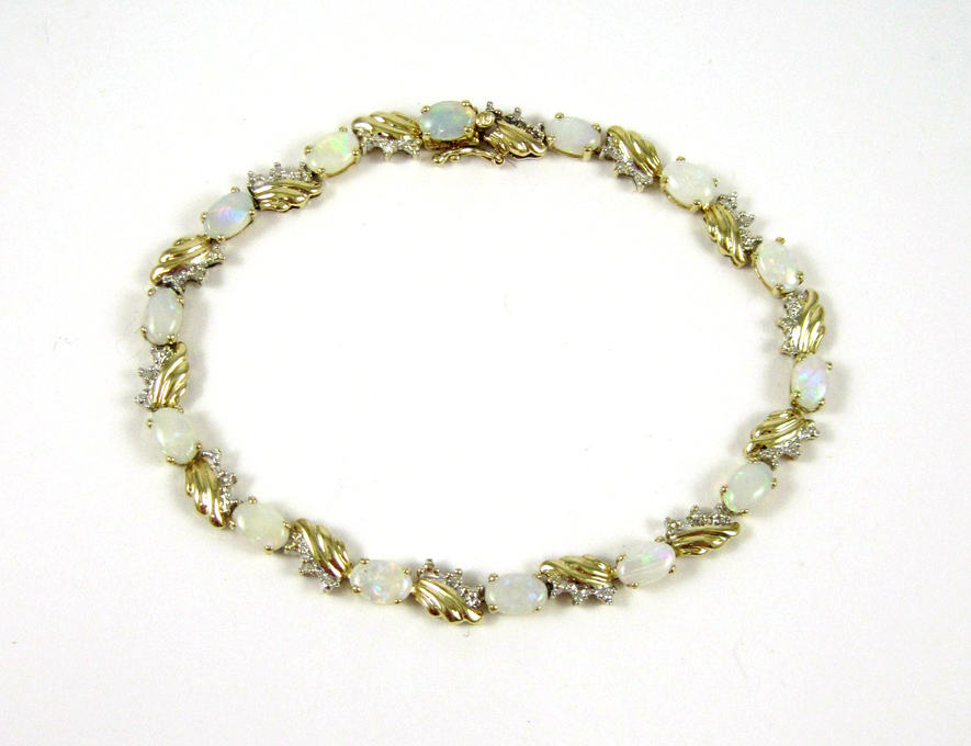 Appraisal: OPAL DIAMOND AND FOURTEEN KARAT GOLD BRACELET measuring - inches