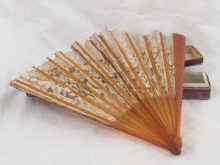 Appraisal: A Victorian blonde tortoiseshell and lace fan box with label