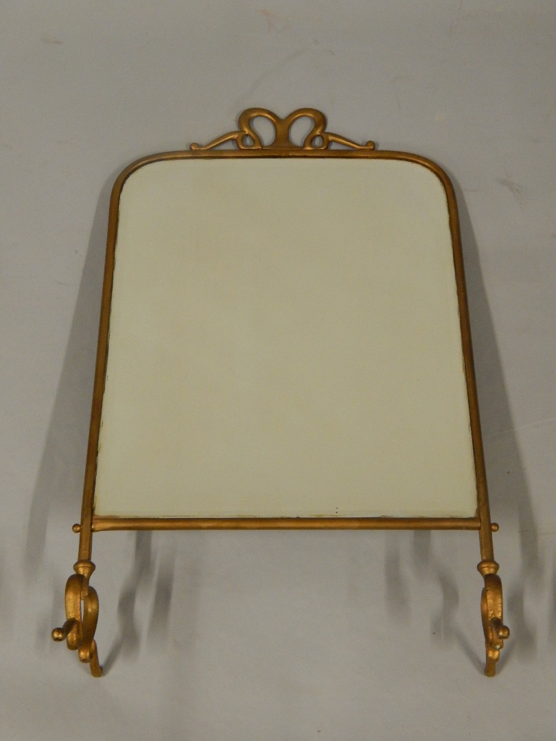 Appraisal: A gold spray printed Art Nouveau cast metal fire screen