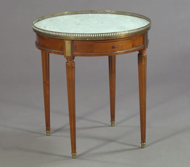 Appraisal: Empire-Style Brass-Mounted Mahogany Bouillotte Table the white circular marble top