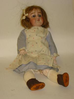 Appraisal: A Simon Halbig bisque character girl doll with blue glass