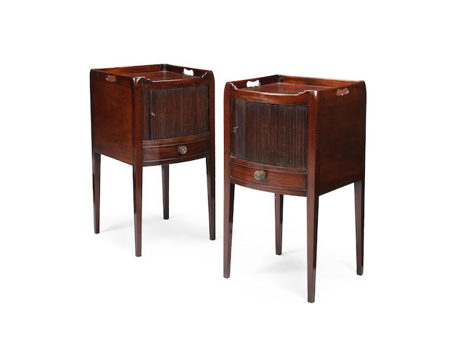 Appraisal: A matched pair of Regency mahogany bedside cupboards of bowfront