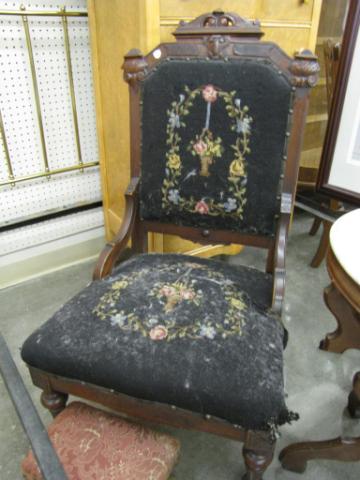 Appraisal: Upholstered Walnut Victorian Armchair needlepoint is in poor condition