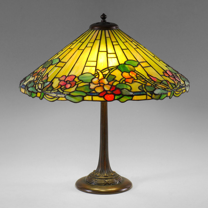 Appraisal: DUFFNER KIMBERLY LEADED GLASS TABLE LAMP Cast bronze base with