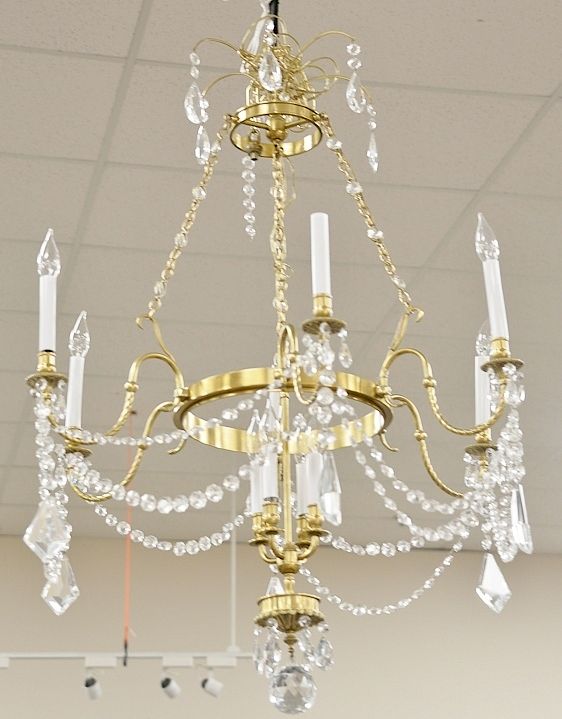 Appraisal: Contemporary chandelier brass and crystal approximate ht in approximate dia