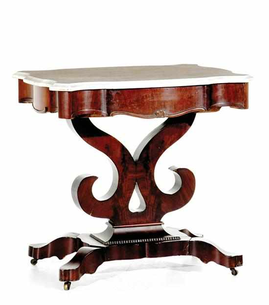 Appraisal: American Classical mahogany and marbletop center table circa turtle-shaped white