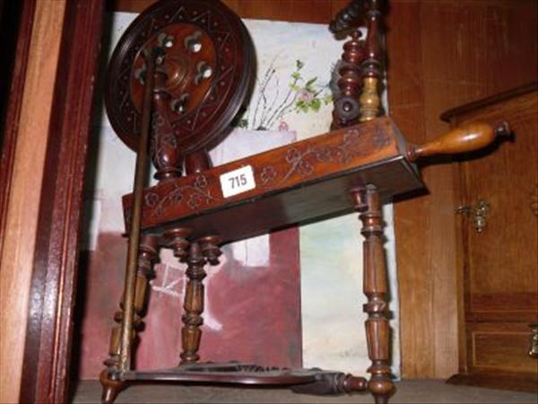 Appraisal: A th century childs mahogany spinning wheel