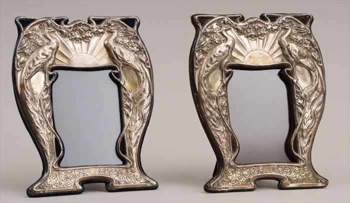 Appraisal: PAIR OF ENGLISH ART NOUVEAU SILVER-ON-VELVET PICTURE FRAMES Marks for