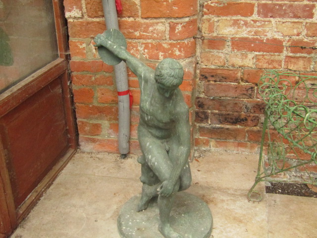 Appraisal: A modern verdigris finish metal statue of a discus thrower