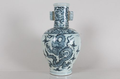 Appraisal: A CHINESE DUO-HANDLED DETAILED DRAGON-DECORATING PORCEL A Chinese Duo-handled Detailed