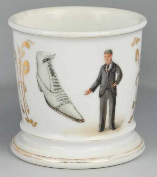 Appraisal: Man Standing Next to Large Shoe Shaving Mug Description No