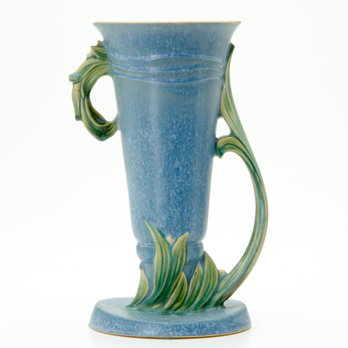 Appraisal: ROSEVILLE Rare blue Velmoss flaring vase with twisted leaves forming