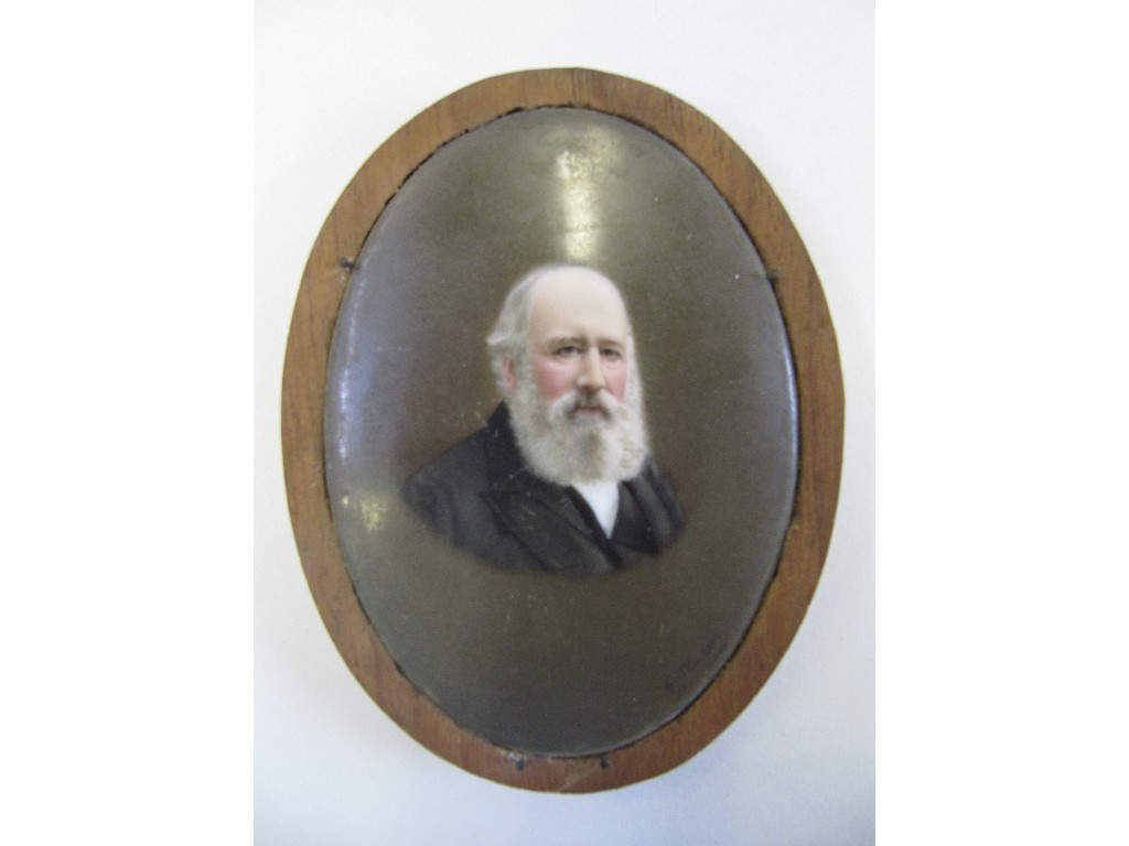 Appraisal: Oval porcelain plaque painted with a portrait of a bearded