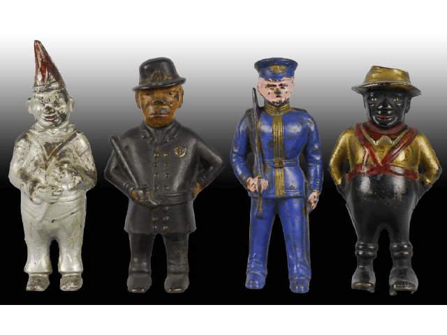 Appraisal: Lot of Cast Iron Figural Still Banks Description Includes policeman