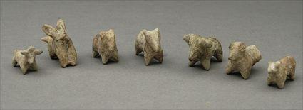 Appraisal: Group of Seven Persian Terracotta Figures of Bulls