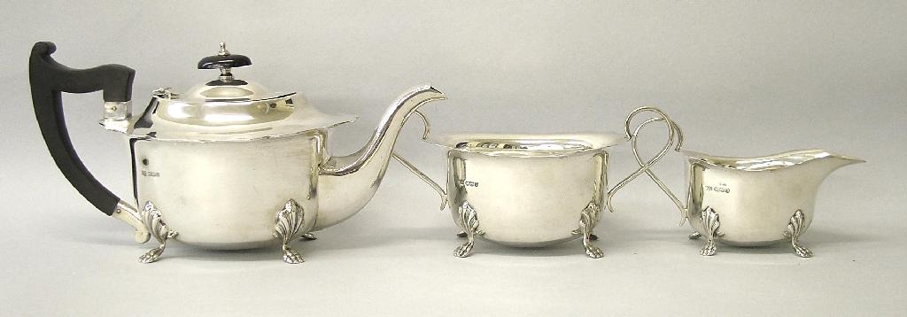 Appraisal: Three piece tea service of oval form with serpentine rims