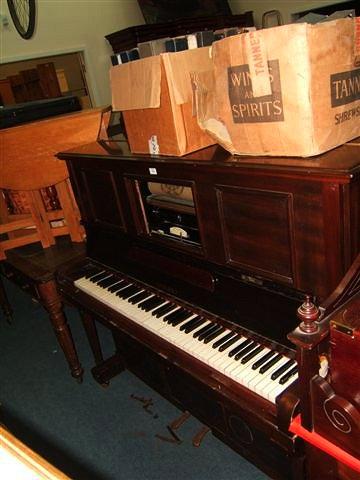 Appraisal: A mahogany cased pianola 'The Dualano' together with a large