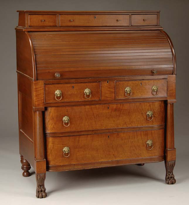 Appraisal: CLASSICAL FIGURED MAPLE TAMBOUR DESK Interesting roll front tambour desk