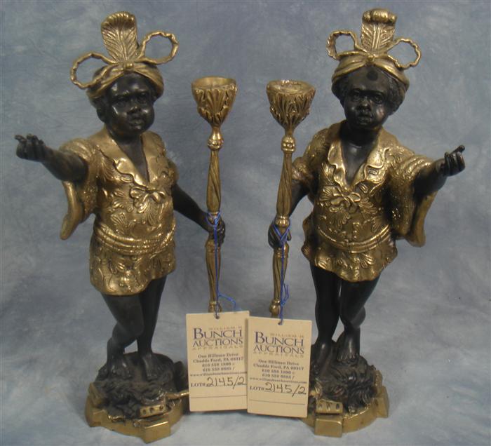 Appraisal: Pair of brass blackamoor candle holders c h Estimate -