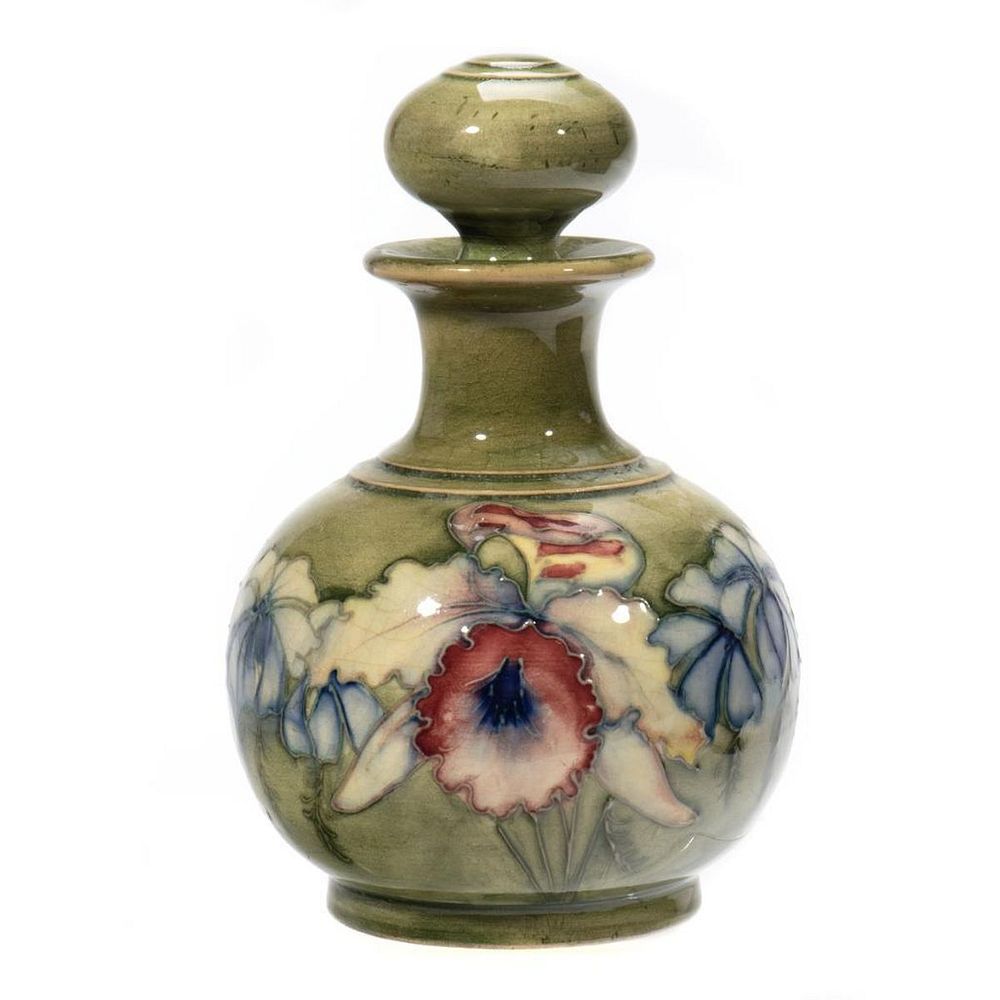 Appraisal: Moorcroft Pottery Stoppered oil jar with Orchid Decoration in cm