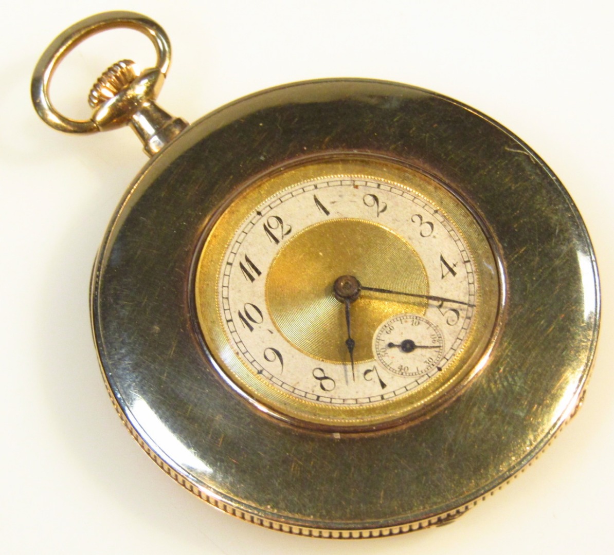 Appraisal: A ct gold cased dress pocket watch with exposed cm