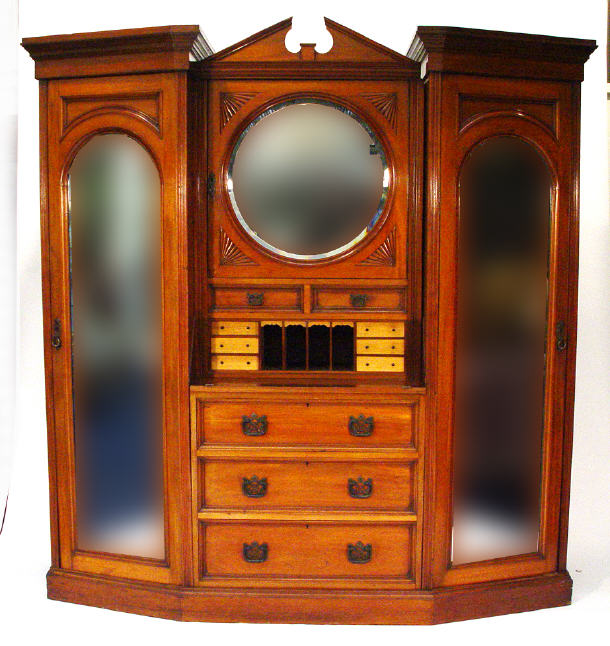 Appraisal: Late Victorian walnut bedroom suite comprised a wardrobe fitted a