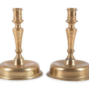 Appraisal: A Pair of Spanish Brass Low Bell Candlesticks Circa Height