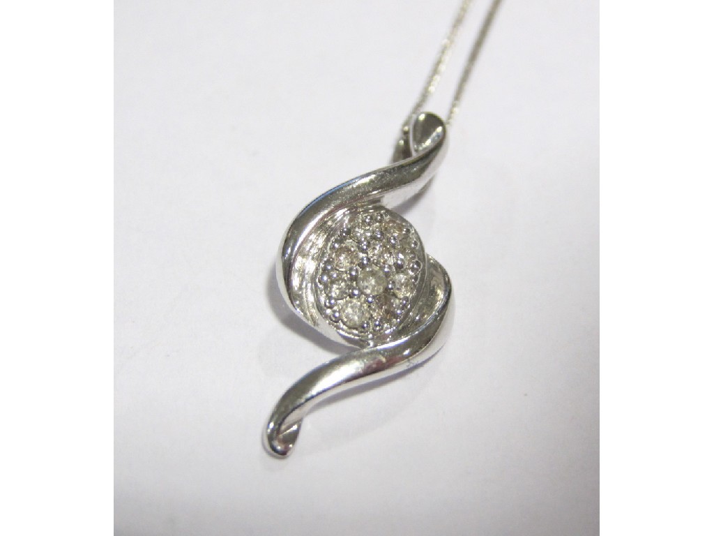 Appraisal: Nine carat white gold sigmoid shaped pendant with central diamond