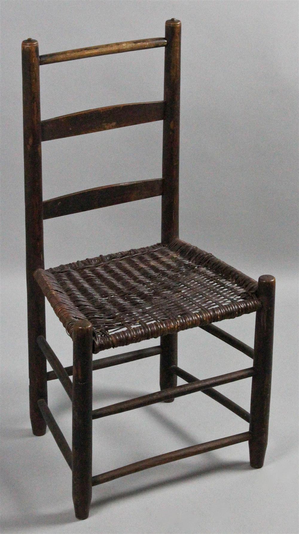 Appraisal: AMERICAN TH CENTURY LADDERBACK CHAIR with a turned upper rail